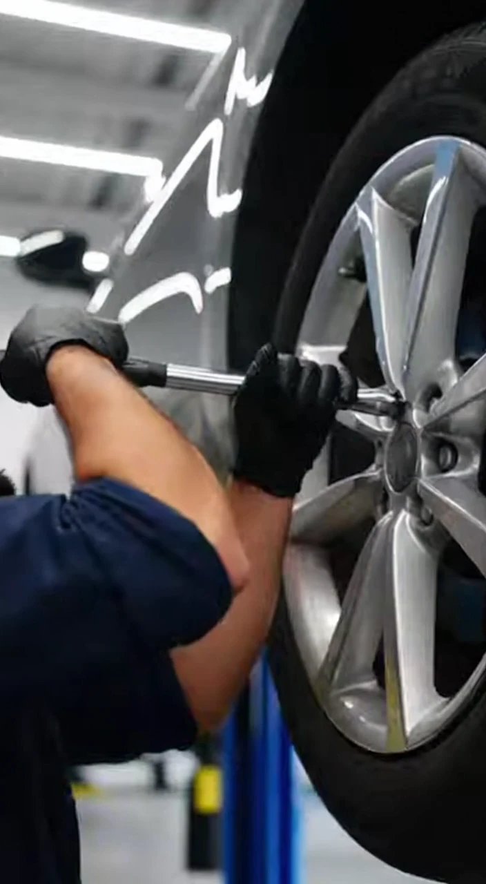 Professional Auto Repair Compilation Mechanics in Action Inspecting Diagnosing and Performing Precision Vehicle Maintenance in a Clean Shop